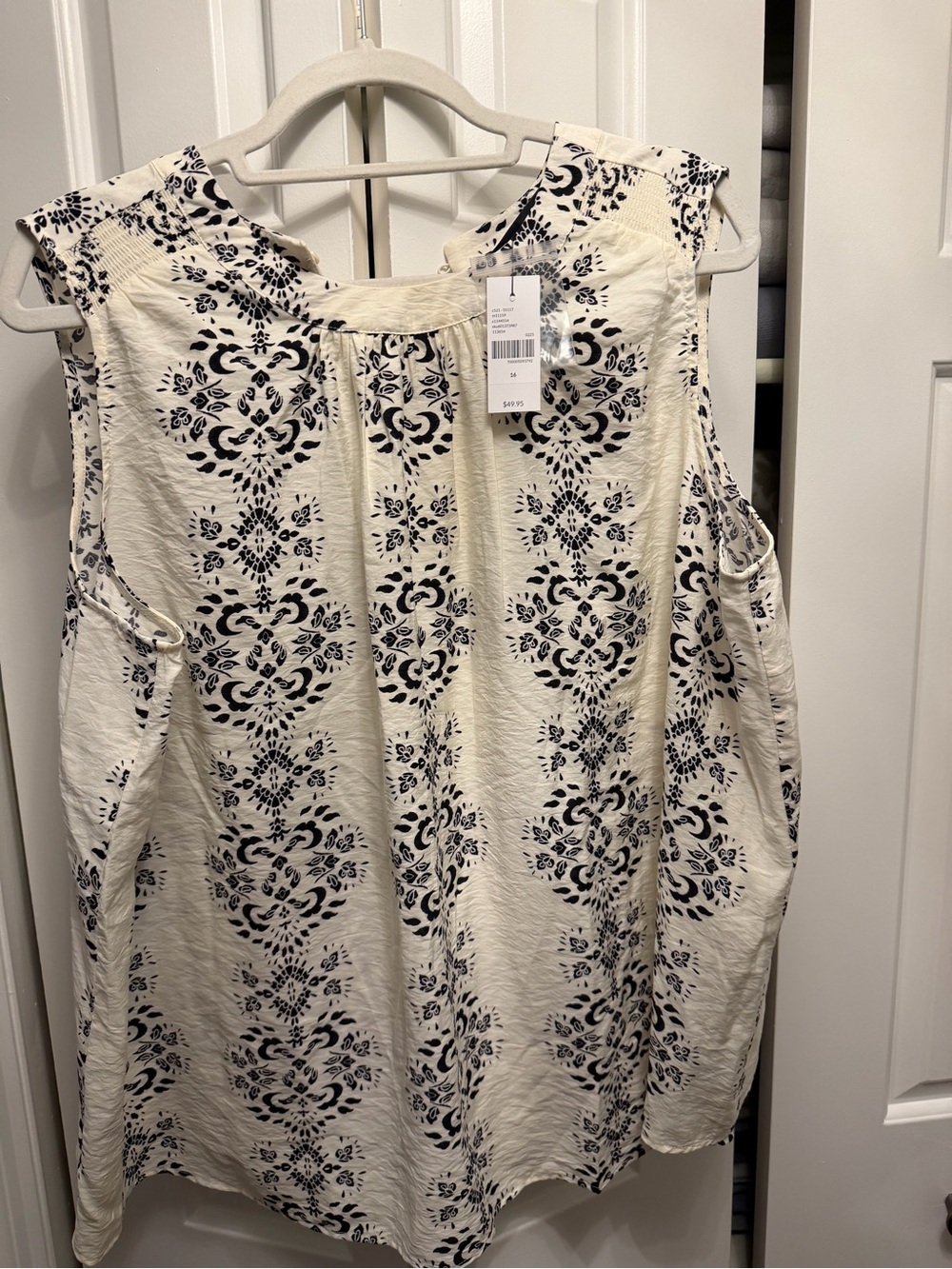 Sleeveless Ivory and Black Printed Blouse